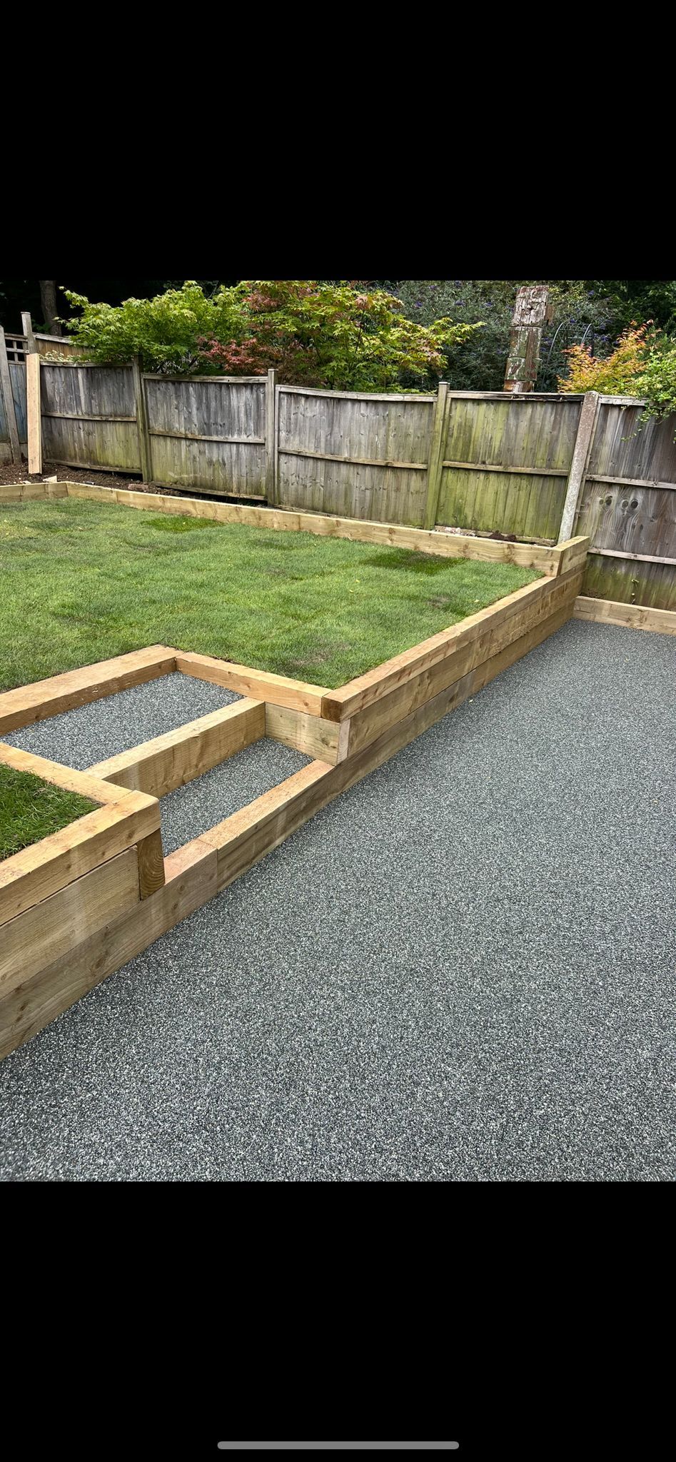Sleeper retaining wall and groundworks by Stoneage Property Care in Wiltshire